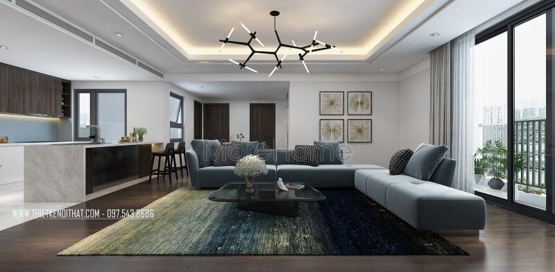 Chiếc sofa nỉ chữ L màu xanh là điểm nhấn nổi bật của căn phòng, đặc biệt gam màu này tạo sự tươi mới cho căn phòng
